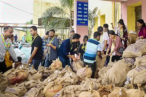 Tripura Floods: Officials and workers prepare food packets for flood-hit people